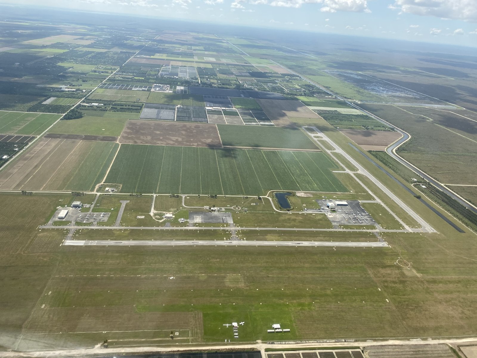 Aerial view of Homestead General Airport from a glider in flight